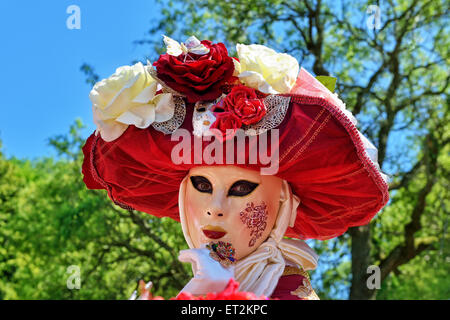 MOUSCRON, BELGIUM-JUNE 06, 2015: Unidentified participant of defile in costumes of Carnival de Venice in Parc Communal during 6 Stock Photo