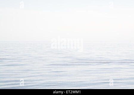 Blurry sea and sky background in Falkenberg, Sweden in afternoon sunlight. Stock Photo