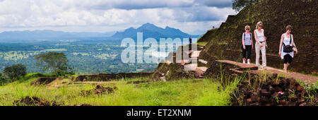 Sigiriya Rock, tourists exploring the ruins of King Kassapa's Palace at the top of Sigiriya Rock Fortress, Sri Lanka, Asia Stock Photo