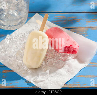 Two ice cream pops on a summer table Stock Photo