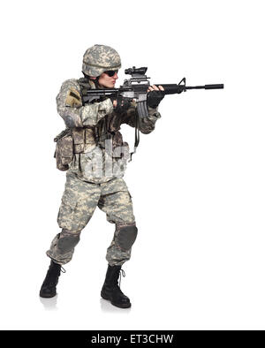 US soldier holding his assault rifle isolation on white Stock Photo