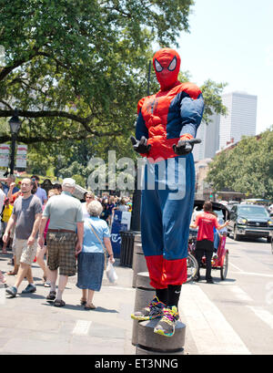 Street performer dressed as spider man on the streets of New Orleans Louisiana Stock Photo