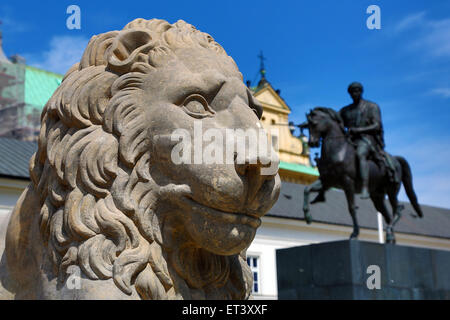 Statue of a lion and Prince Jozef Poniatowski in front of the Presidential Palace in Warsaw, Poland Stock Photo