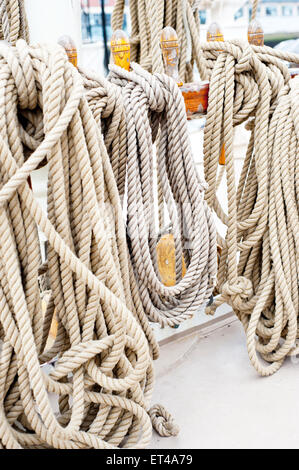 Marine ropes and tackles on the tall ship Stock Photo