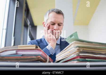 businessman working in office, Leipzig, Saxony, Germany Stock Photo