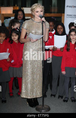 Pixie Lott performs with children from Copenhagen Primary School in aid of Penny for London at St. Pancras International  Featuring: Pixie Lott Where: London, United Kingdom When: 16 Dec 2014 Credit: Phil Lewis/WENN.com Stock Photo