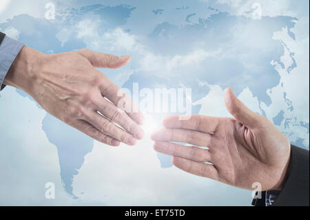 business people trying to shake hand, Bavaria, Germany Stock Photo