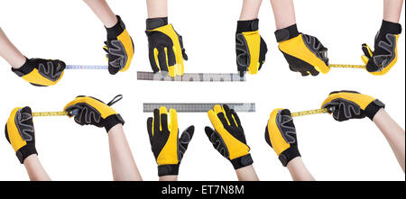 set of worker hands in safety gloves with measuring tools isolated on white background Stock Photo