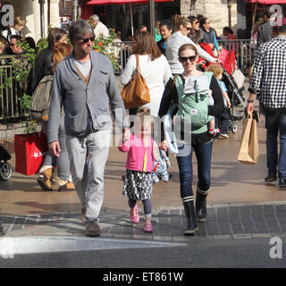 The Killing star, Mireille Enos with husband Alan Ruck take their family Christmas shopping at The Grove in Hollywood  Featuring: Mireille Enos, Alan Ruck, Vesper Vivianne Ruck, Sam Ruck Where: Los Angeles, California, United States When: 21 Dec 2014 Credit: WENN.com
