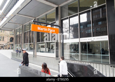 signage above entrance to Martin Place railway station in Martin place,Sydney city centre,australia a speople exit the station Stock Photo