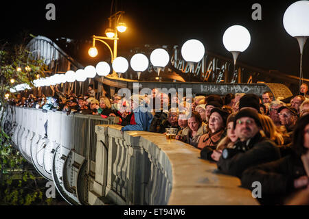 Berlin, Germany, balloons of light limit and visitors at the Bornholmer Strasse Stock Photo