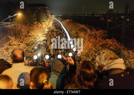 Berlin, Germany, balloons of light limit and visitors at the Bornholmer Strasse Stock Photo