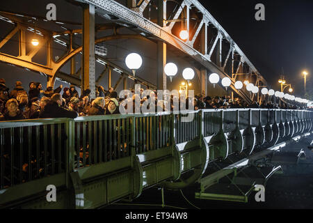 Berlin, Germany, balloons of light limit and visitors at the Bornholmer Strasse Stock Photo