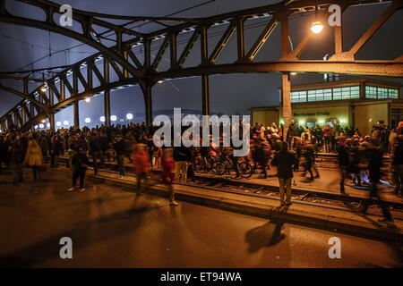 Berlin, Germany, balloons of light limit and visitors at the Bornholmer Strasse Stock Photo