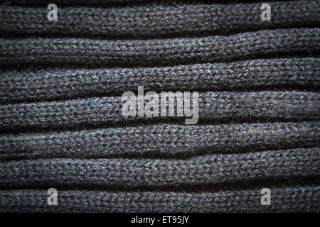 Knitted Black Wool Pattern for background close up Stock Photo