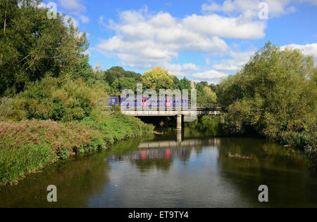 Train crossing the river Avon at Bradford-on-Avon, Wiltshire. Stock Photo