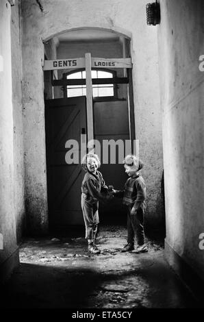 Slums, Benburb street area of Dublin, Republic of Ireland, 11th May 1968. Dublin slums controlled by the municipal authority, the Dublin Corporation, which has had to ignore standards of hygiene and sanitation. Pictured. Father Michael Sweetman, a priest Stock Photo