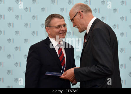 Foreign Minister Lubomir Zaoralek, left, decorates Latvian Bohemian studies scholar Janis Krastins with the annual Gratias Agit prize for spreading the good name of the Czech Republic abroad today, on Friday, June 12, 2015, in Prague, Czech Republic. (CTK Photo/Katerina Sulova) Stock Photo