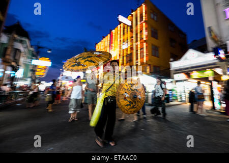 Asia. Thailand, Bangkok. Khao san Road. salesman sunshade. Stock Photo