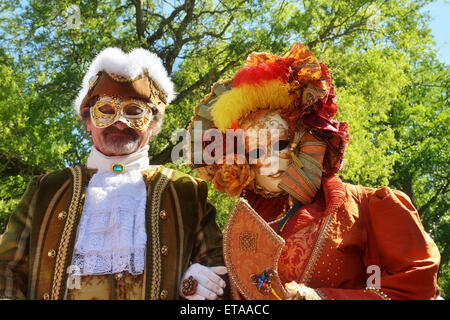 MOUSCRON, BELGIUM-JUNE 06, 2015: Participants of defile in costumes of Carnival de Venice in Parc Communal during 6 edition of V Stock Photo