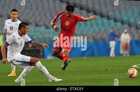 2015 AFC finals match Uzbekistan vs. DPR Korea. Uzbekistan struggled to defeat a gallant DPR Korea in their first pool match.  Featuring: Pak Kwang Ryong Where: Sydney, Australia When: 10 Jan 2015 Credit: WENN.com Stock Photo