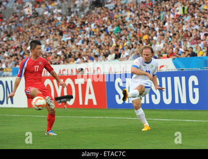 2015 AFC finals match Uzbekistan vs. DPR Korea. Uzbekistan struggled to defeat a gallant DPR Korea in their first pool match.  Featuring: Vitaliy Denisov Where: Sydney, Australia When: 10 Jan 2015 Credit: WENN.com Stock Photo