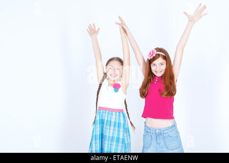 Nice girls standing together Stock Photo