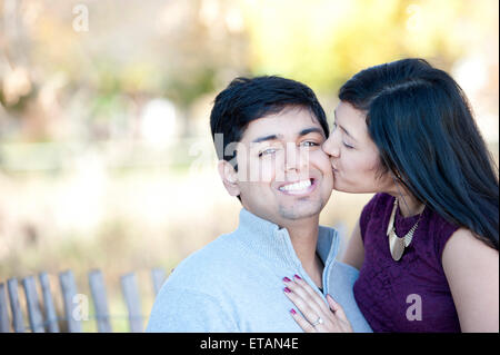 Young Happy Indian Couple Kissing Stock Photo - Alamy
