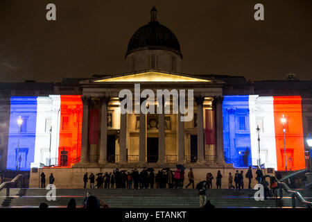 The National Gallery is illuminated with the Tricolor (French flag) in a show of solidarity with the unity march taking place in Paris. Marches and rallys were held in an act of defiance against the brutal killings by terrorists in Paris earlier this week  Where: London, United Kingdom When: 11 Jan 2015 Credit: Mario Mitsis/WENN.com Stock Photo