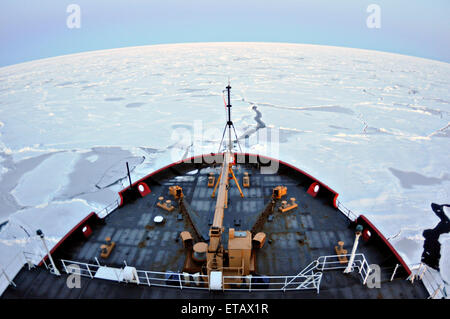 View looking off the bow of the Canadian Coast Guard heavy icebreaker CCGS Louis S. St-Laurent as it breaks ice September 2, 2009 in the Arctic. Stock Photo