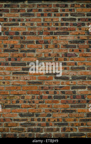 Old yellow and orange brick wall Stock Photo