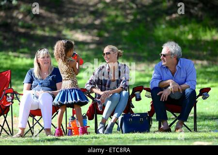 Heidi Klum watches her children play in a soccer game. Half way through the game Heidi's daughter Helene had to leave the pitch after injuring herself.  Featuring: Heidi Klum, Lou Samuel Where: Los Angeles, California, United States When: 17 Jan 2015 Credit: Michael Wright/WENN.com Stock Photo