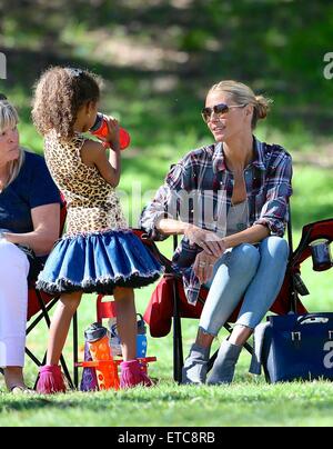 Heidi Klum watches her children play in a soccer game. Half way through the game Heidi's daughter Helene had to leave the pitch after injuring herself.  Featuring: Heidi Klum, Lou Samuel Where: Los Angeles, California, United States When: 17 Jan 2015 Credit: Michael Wright/WENN.com Stock Photo