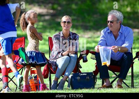 Heidi Klum watches her children play in a soccer game. Half way through the game Heidi's daughter Helene had to leave the pitch after injuring herself.  Featuring: Heidi Klum, Lou Samuel Where: Los Angeles, California, United States When: 17 Jan 2015 Credit: Michael Wright/WENN.com Stock Photo