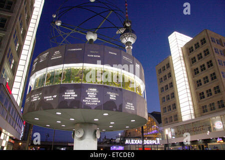 JULY 2009 - BERLIN: the 'Weltzeituhr' (world time clock), in the background the 'Fernsehturm' (television tower), Alexanderplatz Stock Photo