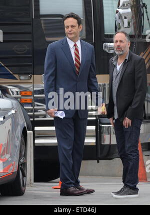 Actor Vince Vaughn wearing a blue suit while eating an apple on the set of 'Unfinished Business' filming in Los Angeles Ca.  Featuring: Vince Vaughn Where: Los Angeles, California, United States When: 20 Jan 2015 Credit: Cousart/JFXimages/WENN.com Stock Photo