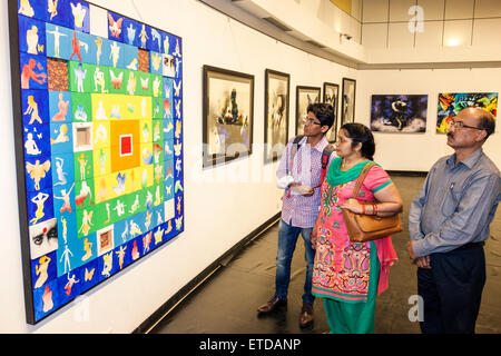 Mumbai India,Indian Asian,Fort Mumbai,Kala Ghoda,Jehangir Art Gallery,contemporary,paintings,adult adults man men male,woman women female lady,couple, Stock Photo