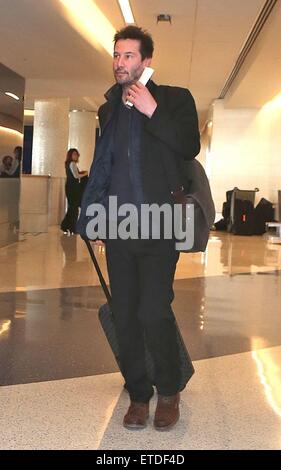 Keanu Reeves departs from Los Angeles International Airport (LAX Stock Photo: 83890473 - Alamy
