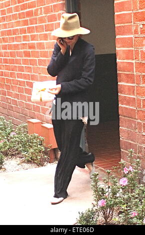 Maggie Gyllenhaal goes to the doctors office holding a gift in Beverly Hills  Featuring: Maggie Gyllenhaal Where: Beverly Hills, California, United States When: 28 Jan 2015 Credit: WENN.com Stock Photo