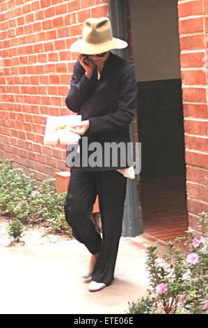 Maggie Gyllenhaal goes to the doctors office holding a gift in Beverly Hills  Featuring: Maggie Gyllenhaal Where: Beverly Hills, California, United States When: 28 Jan 2015 Credit: WENN.com Stock Photo