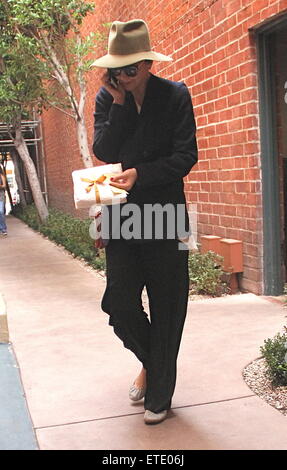 Maggie Gyllenhaal goes to the doctors office holding a gift in Beverly Hills  Featuring: Maggie Gyllenhaal Where: Beverly Hills, California, United States When: 28 Jan 2015 Credit: WENN.com Stock Photo