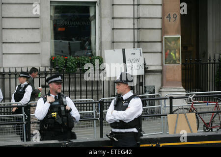 London, UK. 13th June, 2015. Police officers stand guard along the route of the Queen's Birthday Parade near Trafalgar Square, WC2 Credit:  Finn Nocher/Alamy Live News Stock Photo