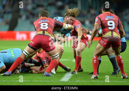 Sydney, Australia. 13th June, 2015. Super Rugby. NSW NSW Waratahs versus the Queensland Reds. Waratahs flanker Michael Hooper is tackled. The Waratahs won 31-5. Credit:  Action Plus Sports/Alamy Live News Stock Photo