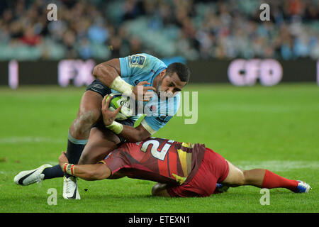 Sydney, Australia. 13th June, 2015. Super Rugby. NSW NSW Waratahs versus the Queensland Reds. Waratahs winger Taqele Nayaravoro is tackled. The Waratahs won 31-5. Credit:  Action Plus Sports/Alamy Live News Stock Photo