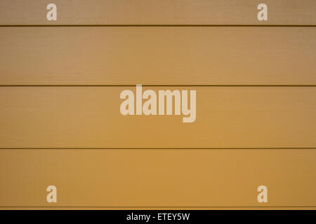 A background of burnt orange siding Stock Photo