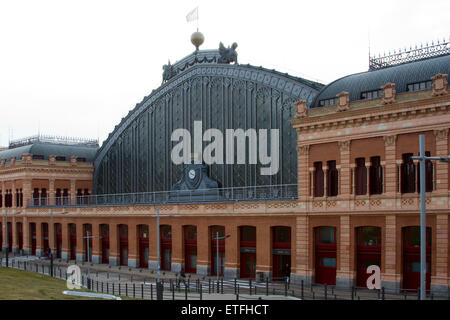 The Atocha Train Station. Busy commuters go about their business in the Atocha Railway Station in Madrid. Stock Photo