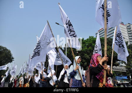 Jakarta, Indonesia - June 13, 2015: The protesters raised the Tawhid