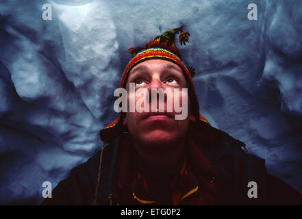 Skier buried in avalanched snow, awating rescue, training exercise for search dogs Stock Photo