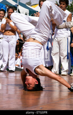 Brazilian martial artist performing Capoeira Stock Photo