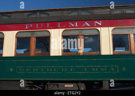 Exterior detail closeup of a restored Pullman passenger train car on display at a train museum in the United States. Stock Photo